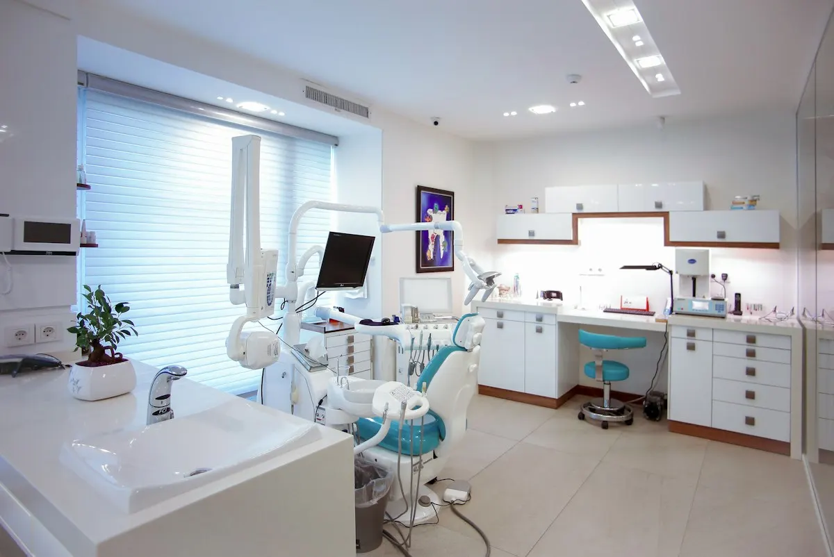 Treatment room with cabinets and a window