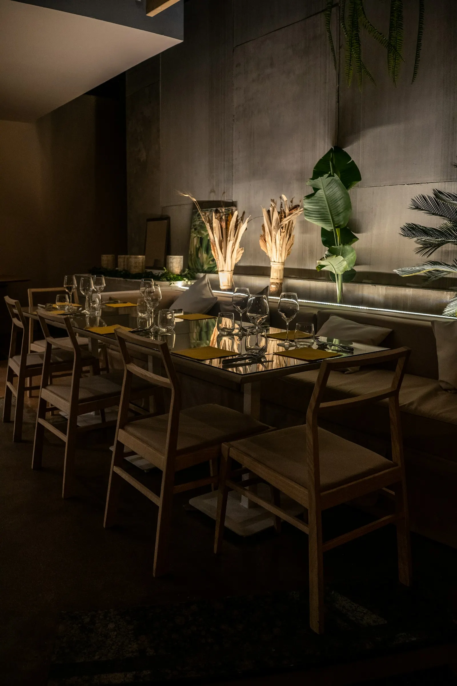 The Cellar Room set for a private dinner, one long table under low lights
