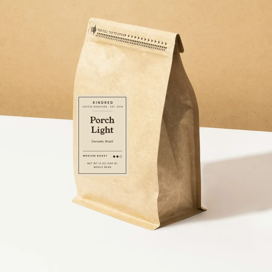 Porch Light coffee in a kraft bag with a medium roast label