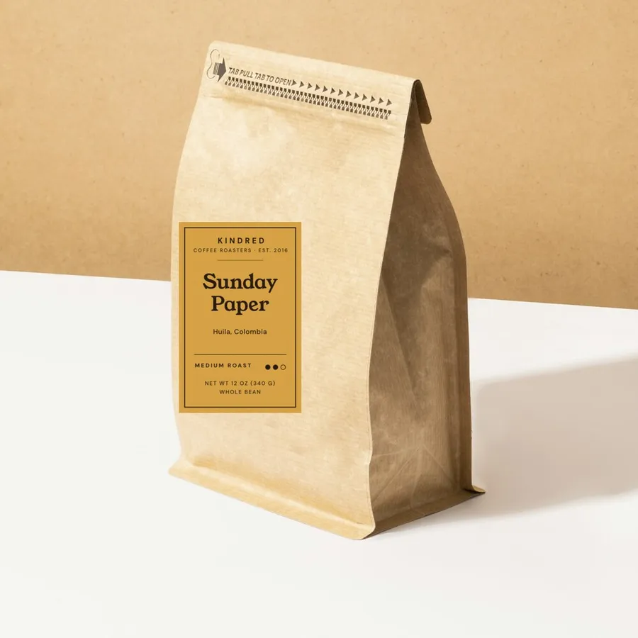 Sunday Paper coffee in a kraft bag with a medium roast label