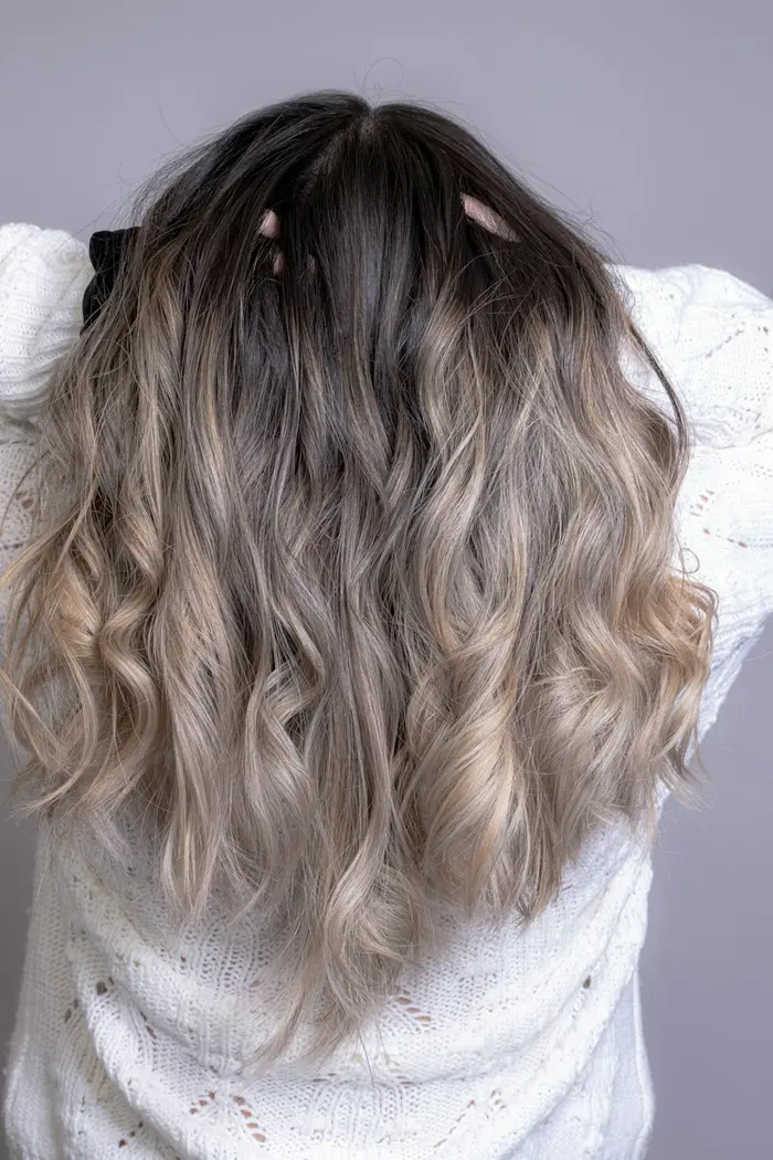 Long waves with a soft brunette to caramel ombré