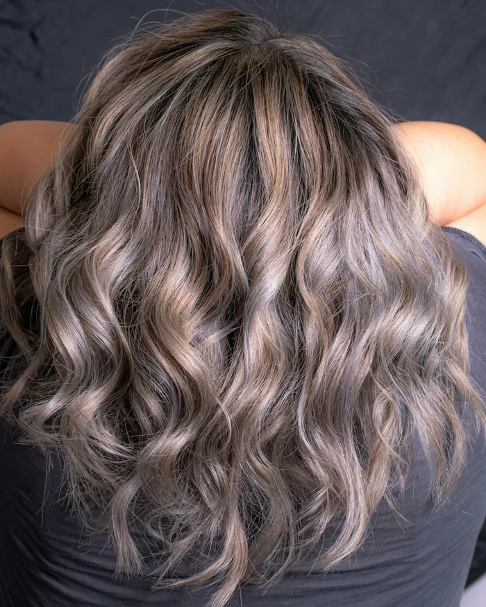 Long silver and ash brown waves from behind